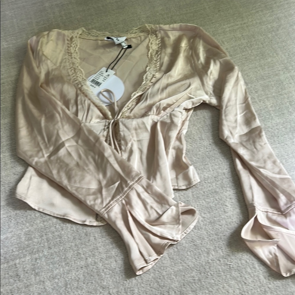 Elegant Cream Blouse with Lace Detail